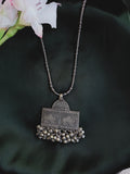 Metallic antique neckpiece